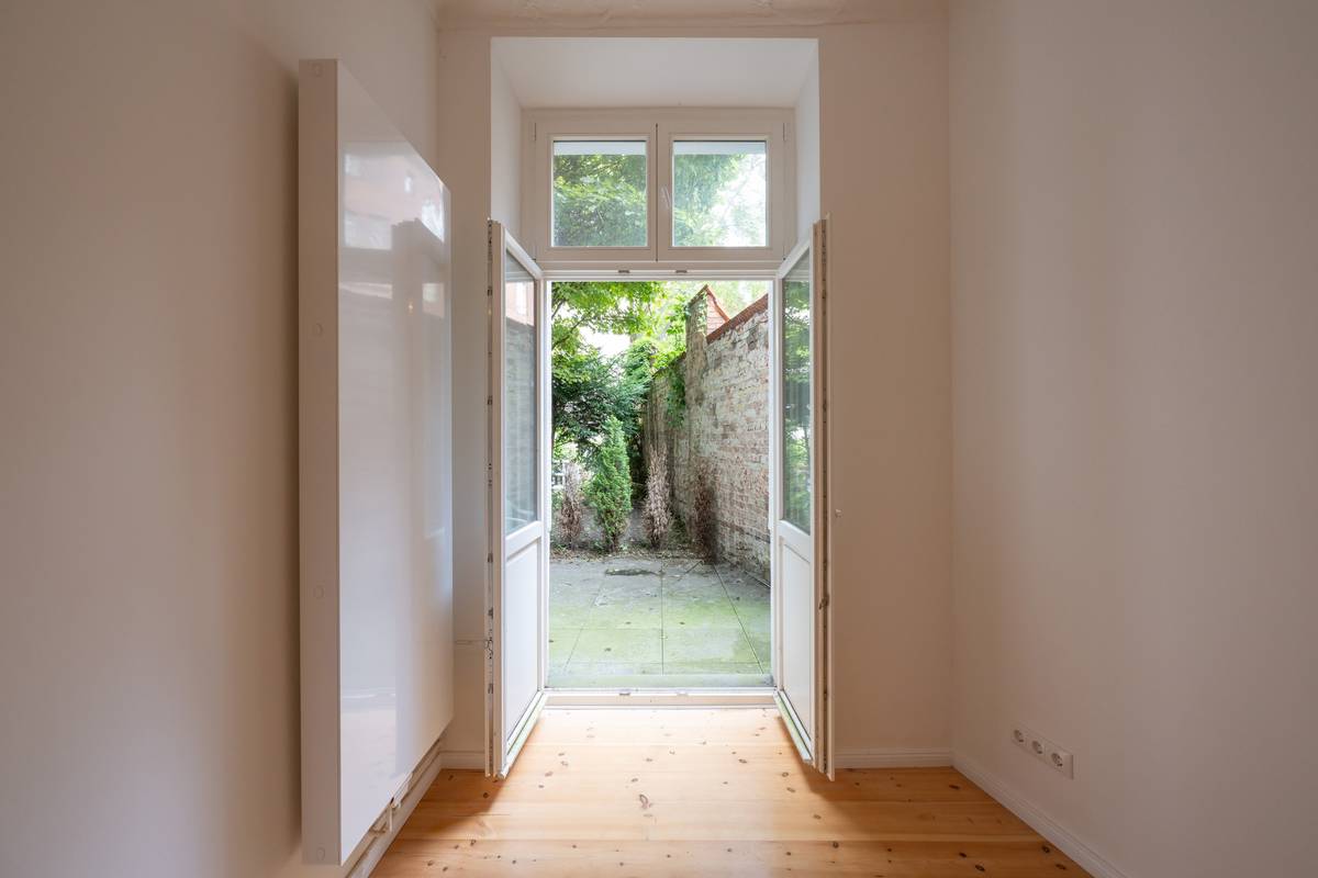 Mit Terrasse und Privatgarten