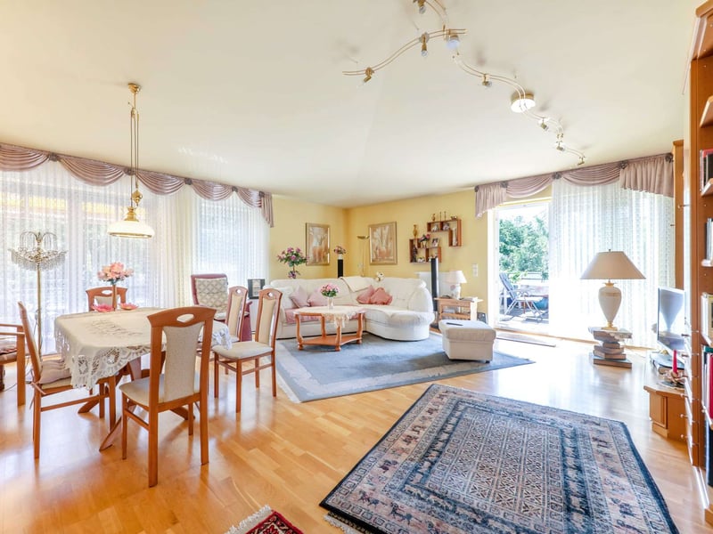 A 126 m² penthouse with 3 rooms and a 65 m² wraparound roof terrace overlooking the countryside